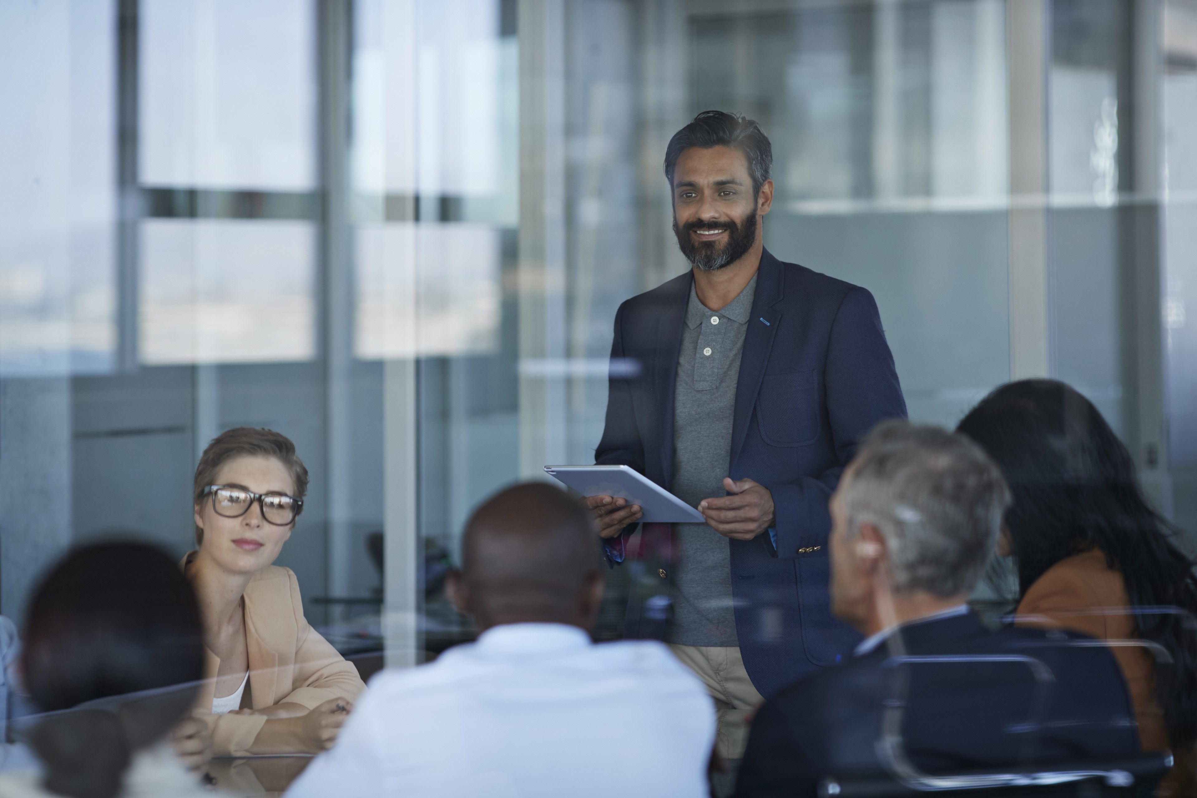 Group of professional looking smartly dressed business people